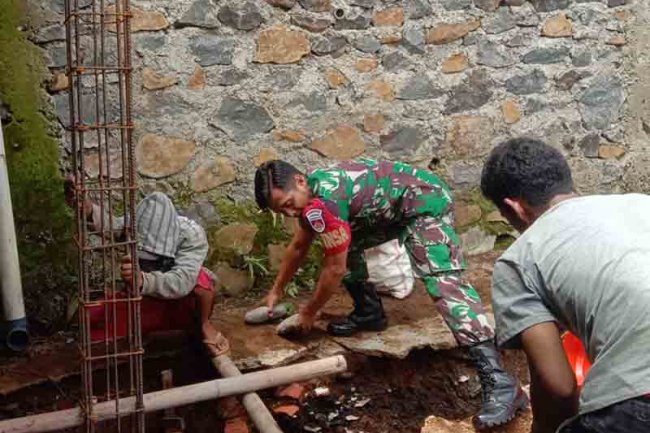 Melalui Karya Bhakti  Bhabinsa Dan Masyarakat Menjadi Solid Dan Kuat