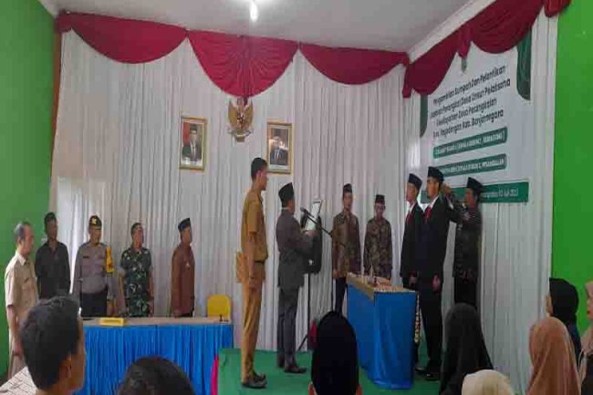 Danposramil Pagedongan Beserta Babinsa Dan Bhabinkamtibmas Hadiri Pelantikan Pengambilan Sumpah Jabatan Perangkat Desa Pesangkalan