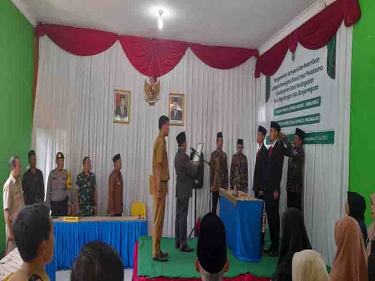 Danposramil Pagedongan Beserta Babinsa Dan Bhabinkamtibmas Hadiri Pelantikan Pengambilan Sumpah Jabatan Perangkat Desa Pesangkalan