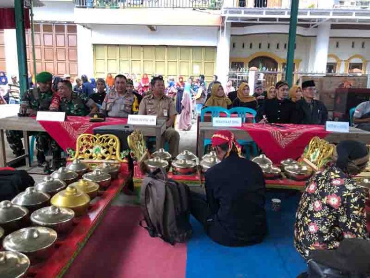 Babinsa Hadiri Sekaligus Pengamanan Acara Ruat Bumi Di Desa Binaan