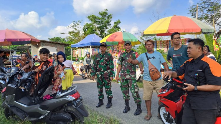 2 Orang Anggota Babinsa Posramil Pagedongan Laksanakan Pengamanan Hiburan