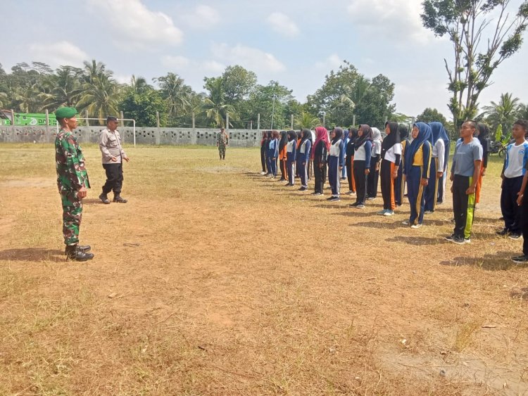 Babinsa 01 Bersama Bhabinkamtibmas Melaksanakan Kegiatan Rutin Pelatihan Paskibra