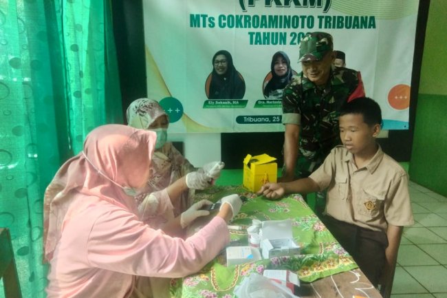 BABINSA PUNGGELAN DAMPINGI CEK KESEHATAN GRATIS (CKG) DAN IMUNISASI 